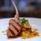 Costilla de Cordero a la Parrilla con Milhojas de Calabaza y Orejones