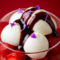 Espuma de Idiazábal con Fresas confitadas y Reducción de Cabernet