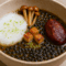 Lenteja Caviar Guisada al Curry Japonés con Ganso, Perdiz y Aire de Coco