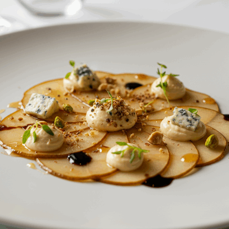 Carpaccio Templado de Peras Asadas al Martini Blanco con Quesos y Frutos Secos