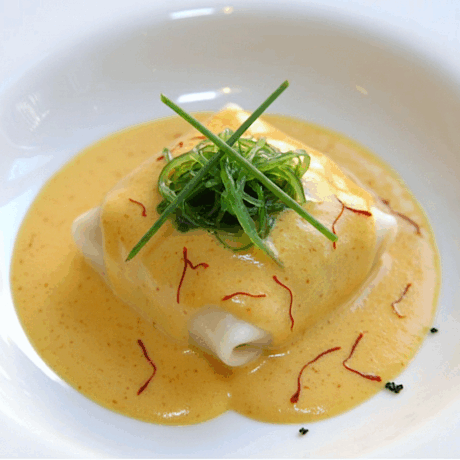 Ravioli de Mar con Salsa de Azafrán al Vermut