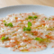 Carpaccio de Gamba Roja con Aceite de Limón y Cebollino Fresco