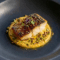 Pescado con Miel y Soja sobre Crema de Maíz Ahumado y Pistachos