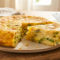 Tortilla de Patata Melosa con Cebolleta, Puerro y Ajetes